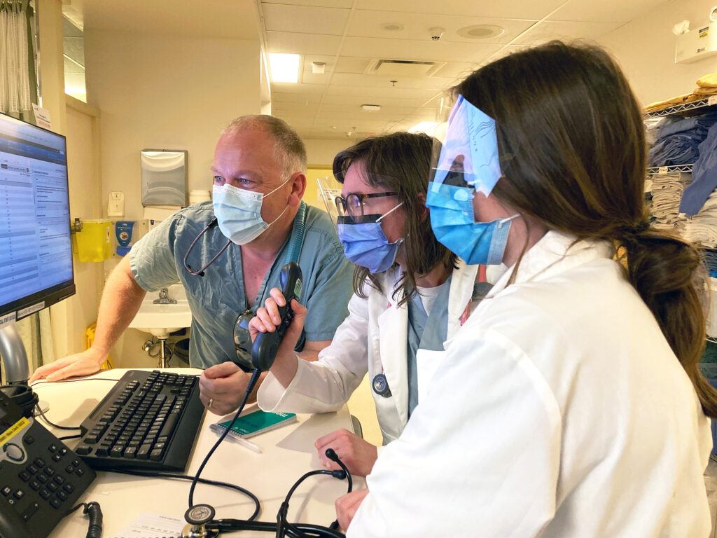 Health care providers consult computer